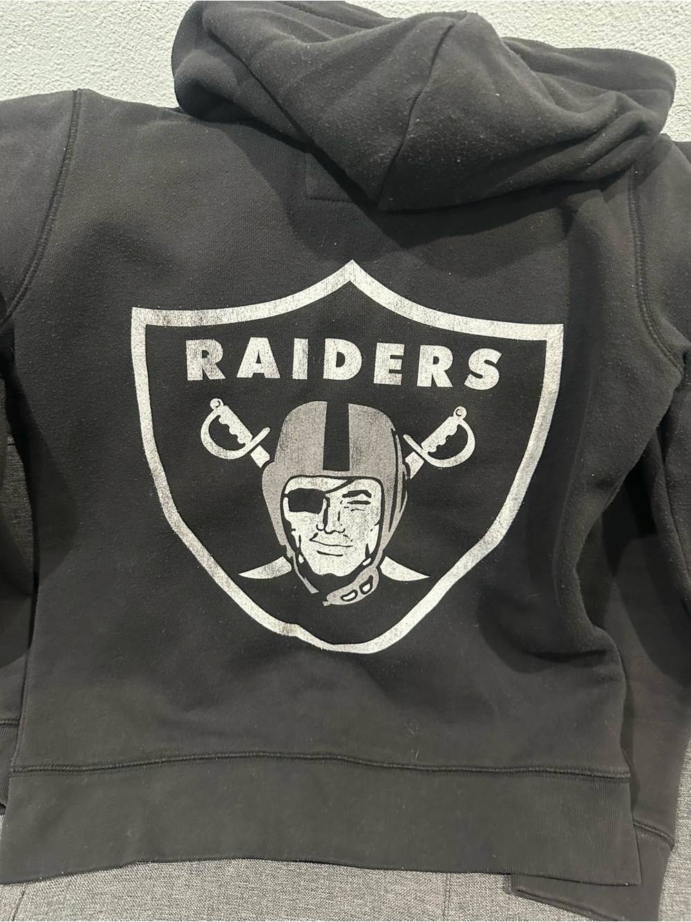 Junk Food Clothing Black Kids Raiders Hoodie with Silver Shield Graphic